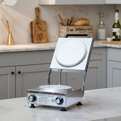 Machine de fabrication de cônes de sucre adaptée à la fabrication de cônes commerciaux