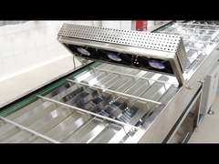 Convoyeur de refroidissement de rassemblement